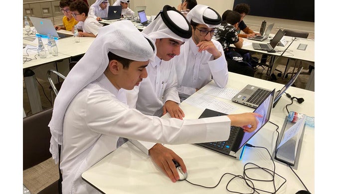 Local high school students utilizing their programming skills in the Creative Space at HBKU’s College of Science Engineering Python Competition 2023.