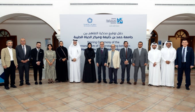 HBKU and The Center for Wellbeing representatives during the signing ceremony