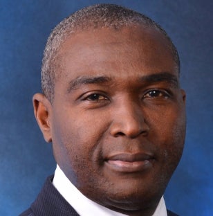 HE Dr Philip Mshelbila