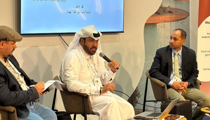 QBG official during a panel talk