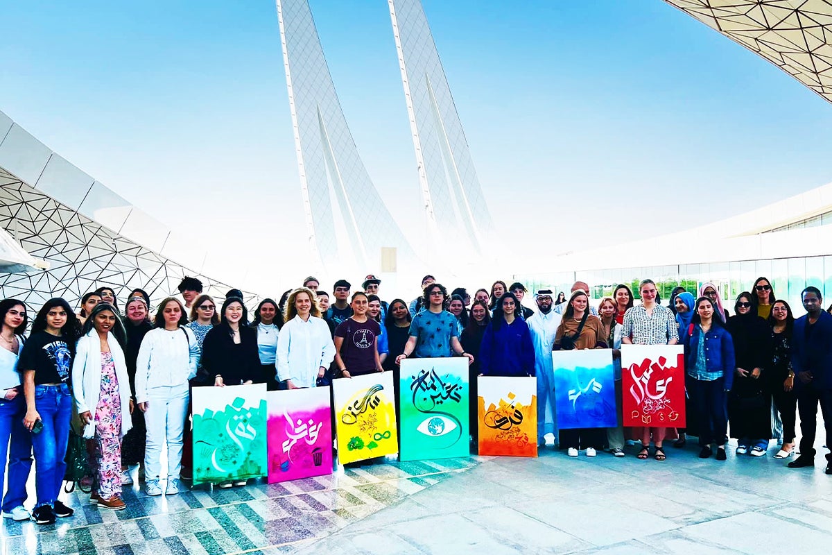The Global Innovation in Sustainability Summit 2023 participants displaying their finished canvas featuring creative interpretations of the UN’s Sustainable Development Goals.