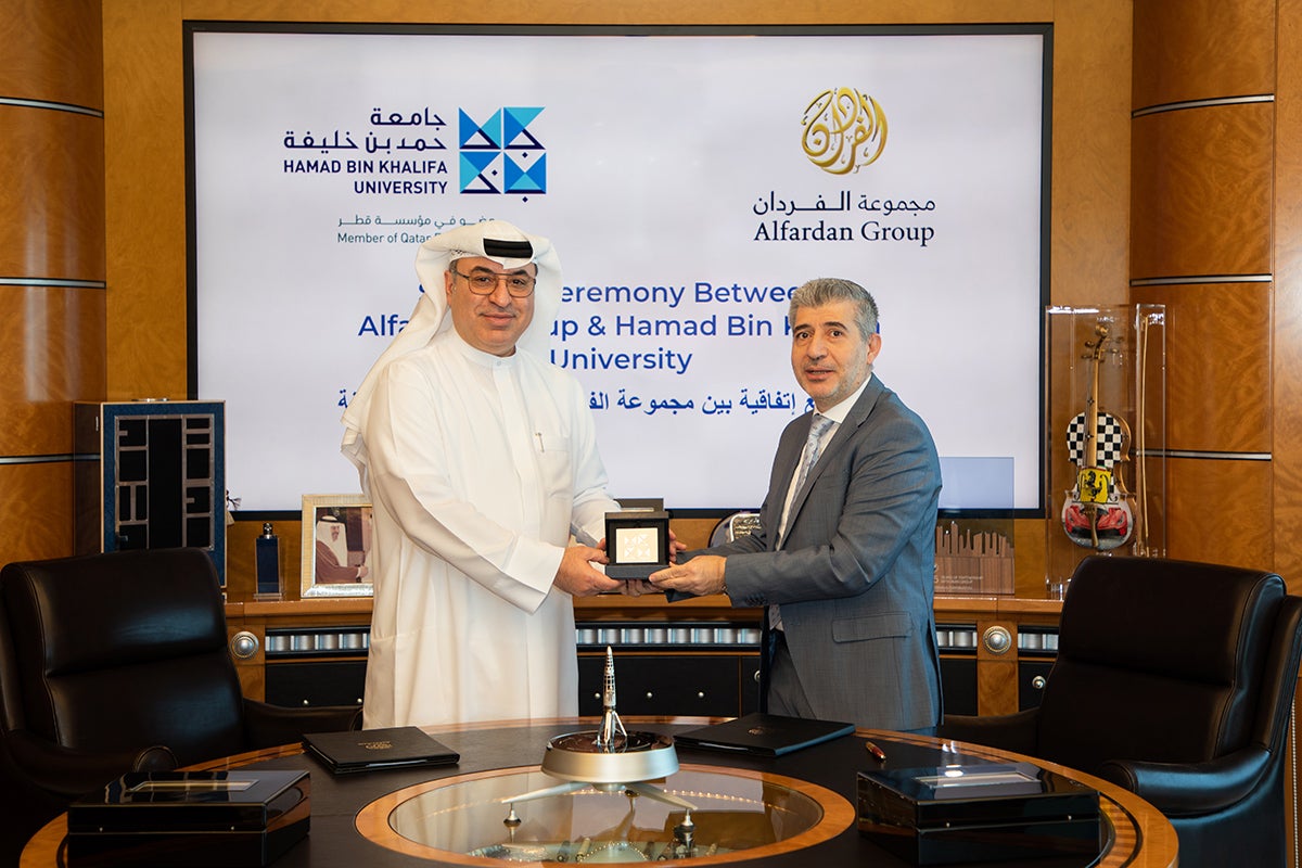 The agreement was signed by Omar Alfardan (left), President and CEO of Alfardan Group, and Dr. Ahmad M. Hasnah, President of HBKU.
