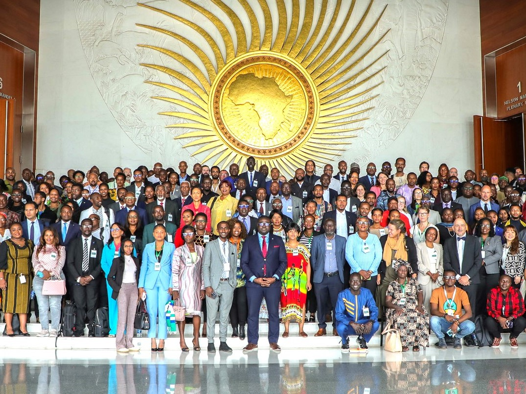 Professor Damilola Olawuyi and the rest of the College of Law delegation networking with international development experts, policymakers, and their peers.