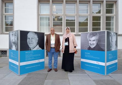 Ghadeer Abuoda, a College of Science and Engineering student in the company of Dr. Ahmed Elmagarmid, executive director of QCRI, at the Seventh Heidelberg Laureate Forum.