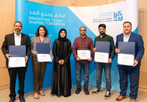 Several Education City Innovative Entrepreneurship Program award recipients celebrate their accomplishment