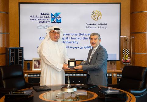 The agreement was signed by Omar Alfardan (left), President and CEO of Alfardan Group, and Dr. Ahmad M. Hasnah, President of HBKU.