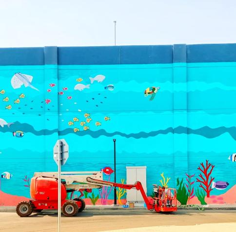 Wall of Art by HBKU Artist Breathes Life into an Urban Space