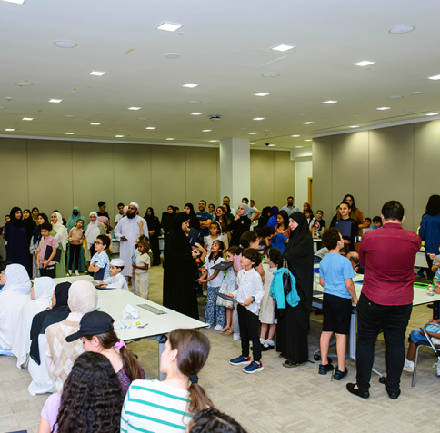 Local youth participate in one of the QCRI Creative Space Summer Camp 2023’s workshops.